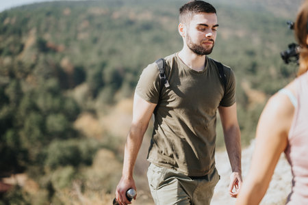 Outdoor Adventure. Hiking in the Wilderness with Two Active Menの写真素材