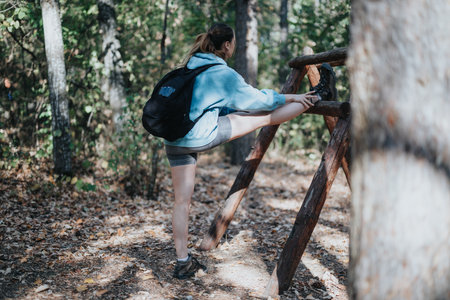 Healthy Outdoor Adventure. Hiker Enjoying a Sunny Day on a Mountain Trail