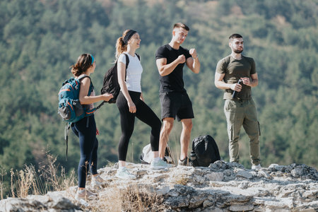 Exploring the Wilderness. Adventurous Hikers Enjoying a Sunny Day in Natureの写真素材