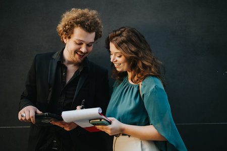 Successful Business Executives Discussing Innovative Growth Strategies in Urban City Areaの写真素材