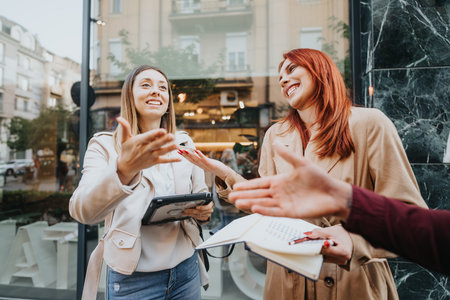Young, 20s Business Team Discussing Analytics for Market Research in Urban Cityの写真素材
