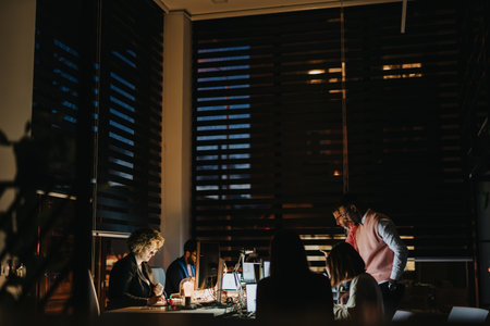 Collaborative Business Team Analyzing Financial Data for Project Developmentの写真素材