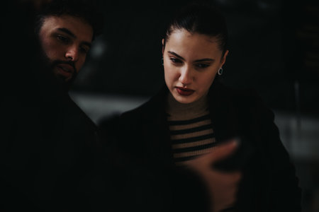 Businesspeople collaborating on a cloudy day, discussing business expansion, financial planning, and market research.の写真素材