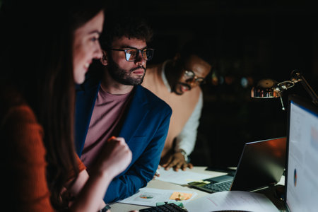 Creative Business Team Analyzing Reports for Project Development and Growthの写真素材