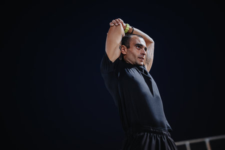 Evening Workout: Active Man Training Outdoors for Successの写真素材