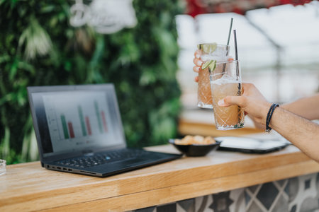Cropped photo of business partners cheering after successful negotiated business deal.の写真素材