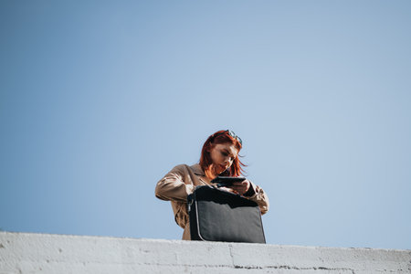 Young business people brainstorming and discussing innovative digital marketing strategies for their successful start-up team in the urban city.の写真素材