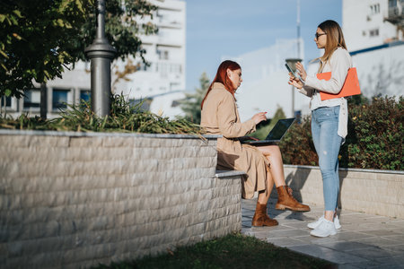 Business people focused on marketing strategy, data analytics, and digital marketing. Collaborating for success in the urban city.の写真素材