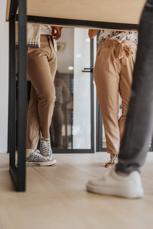 Successful Business Team Sharing Ideas and Analyzing Financial Statistics in Corporate Officeの写真素材