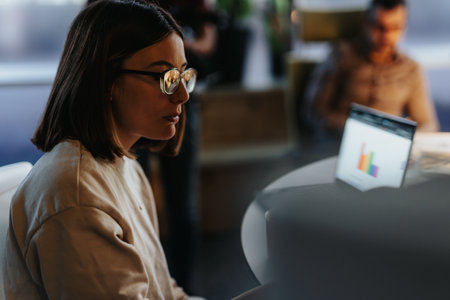 Successful multiethnic team collaborating on business growth strategy in office.の写真素材