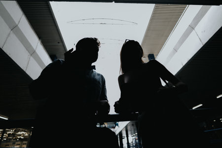 Silhouette photo of young executives discuss new projects and profitability, embracing outdoor work for success and sustainability.の写真素材