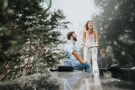 Professionals in an urban center plan for business growth and development through effective communication and teamwork.の写真素材