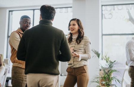 Business colleagues collaborating and discussing new project in a pleasant atmosphere.の写真素材