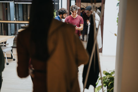 Business people collaborate on project development, discussing strategies for growth and profitability.の写真素材