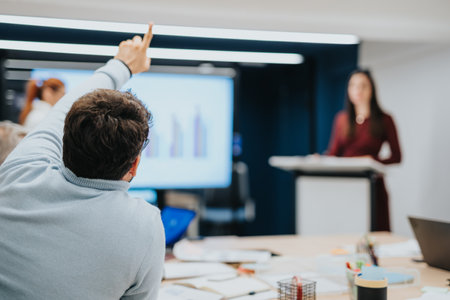 Multicultural business people collaborating and discussing strategies for success in a corporate office.の写真素材