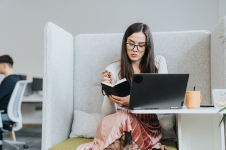 Businesswoman analyzing statistics, discussing business growth, and making innovative decisions for successful expansion.の写真素材