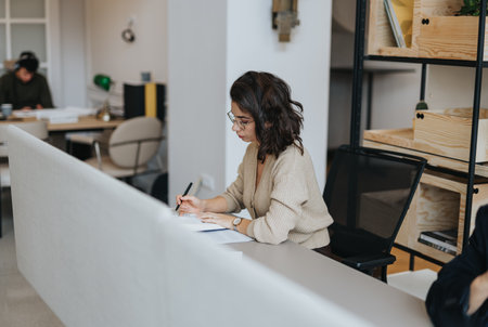 Successful woman discussing project solutions in modern office.