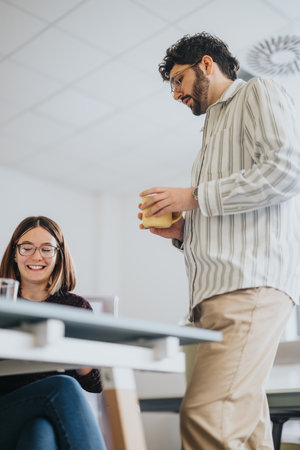 Business colleagues collaborating for success in a creative office.の写真素材
