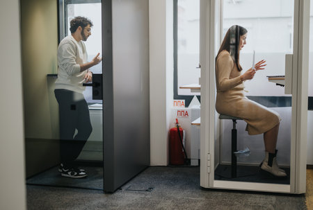Successful businesspeople analyzing statistics in a video meeting to discuss and find possible solutions for project work.の写真素材