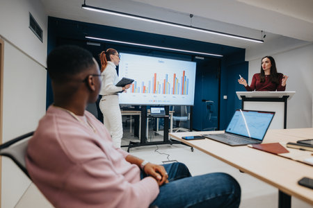 Successful business workshop. Collaboration, innovation, and profit growth. Employees listening to business lecture.の写真素材