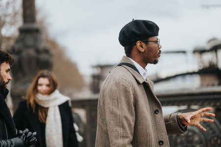 A multicultural group of business colleagues in stylish winter attire are captured engaging in a...