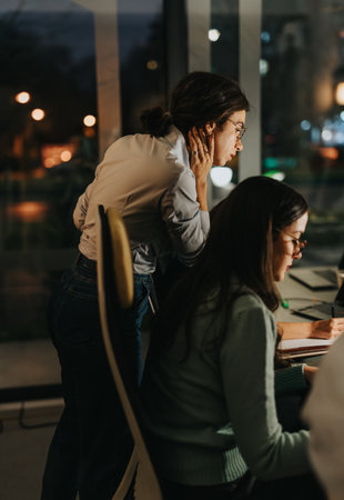 Multigenerational team analyzing business strategies for company expansion.の写真素材