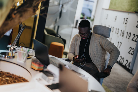 Diverse colleagues in a corporate office discussing business strategies for profitability and growth.の写真素材