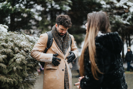Young business professionals in snowy urban setting, winter work lifestyle.の写真素材