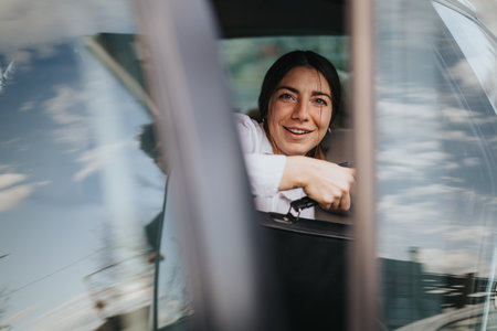 Businesswoman in car, city life, commuting to work, urban lifestyle