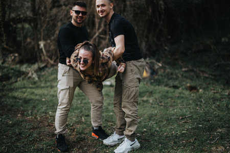 Three friends enjoying a playful moment in a forest setup