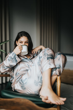 Relaxed woman lounging in a comfortable chair at home, embracing leisure time