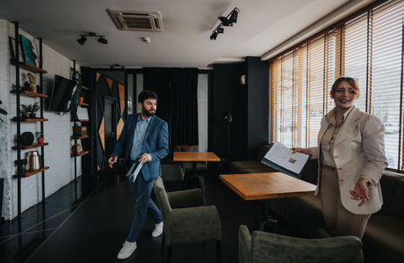 Professional team analyzing data in a modern office settingの写真素材