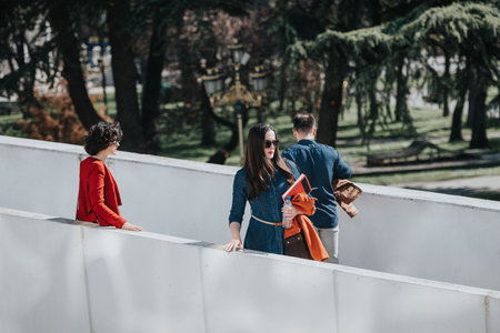 Confident businesspeople enjoying a break outdoors in a lush urban park