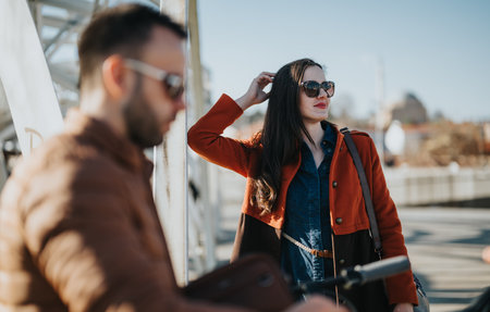 Colleagues in casual attire discussing business strategy outdoors
