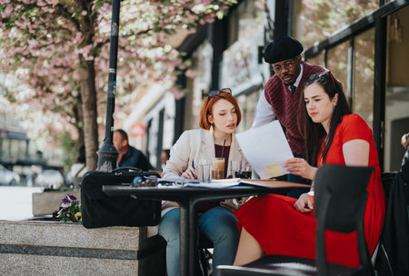 Business entrepreneurs discussing strategies at an outdoor meetingの写真素材