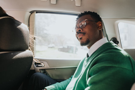 Business professionals commuting together in a car during work hours