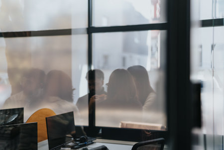 Successful business people enjoying a relaxing lunch break togetherの写真素材