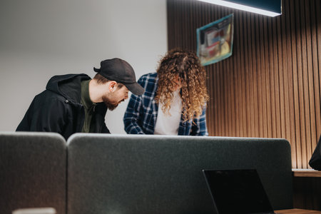 Casual business meeting in a modern office space with young professionals