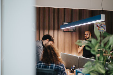 Business meeting in a modern office setting with diverse colleagues