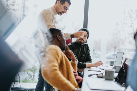 Successful teamwork in a diverse office environment.の写真素材