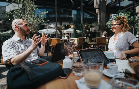 Startup team in outdoor business meeting discussing strategy and ideasの写真素材