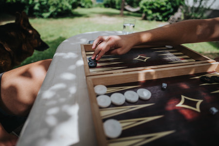 Outdoor backgammon game with friends on a sunny day