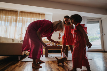 Family bonding at home with playful moments and joyの写真素材