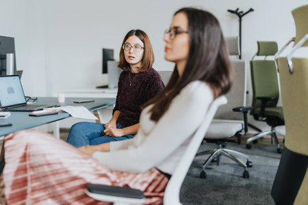 Business professionals collaborating on project development and strategy.の写真素材