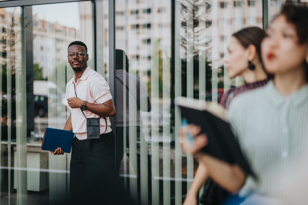 Business professional arriving for a modern office meetingの写真素材
