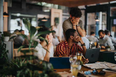Diverse team collaborating in a meeting at a modern coffee bar, discussing ideas and strategies