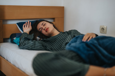 Woman Resting in Bedの写真素材