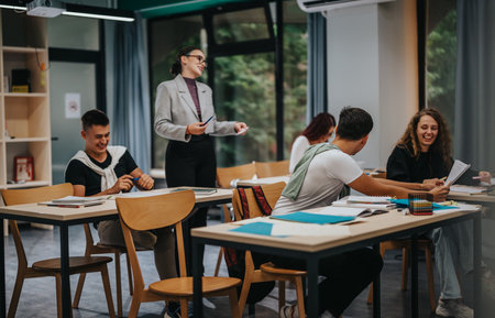 Engaged students interacting during a lively classroom sessionの写真素材