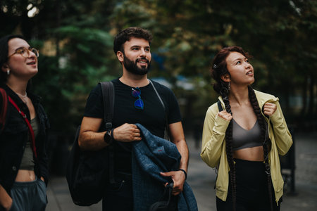 Group of students and professor enjoying a discussion in natureの写真素材