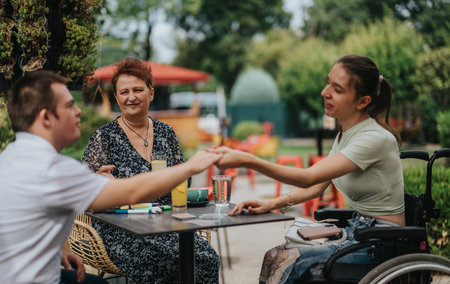 Inclusive group enjoying a friendly outdoor gatheringの写真素材